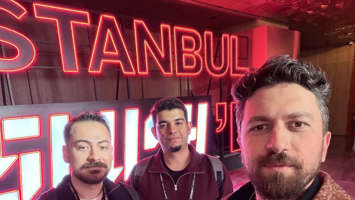 Mert Özeren, Oğuzhan Ulukaya and Emre Elbeyoglu in front of the neon ISTANBUL Slush'D sign at Istanbul Ignited by Slush'D 2026